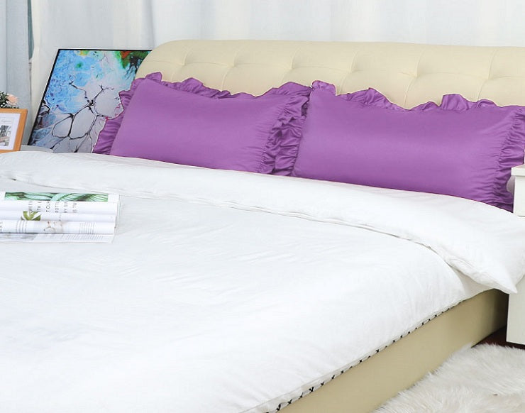 purple ruffled pillow shams